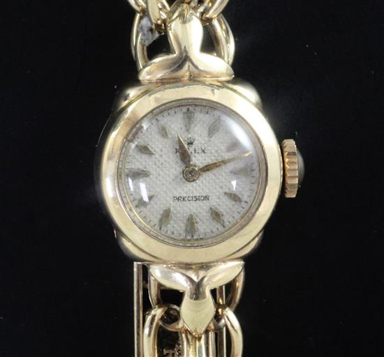 A ladys 1950s 9ct gold Rolex manual wind wrist watch,